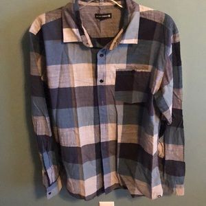 Men’s plaid button down shirt.